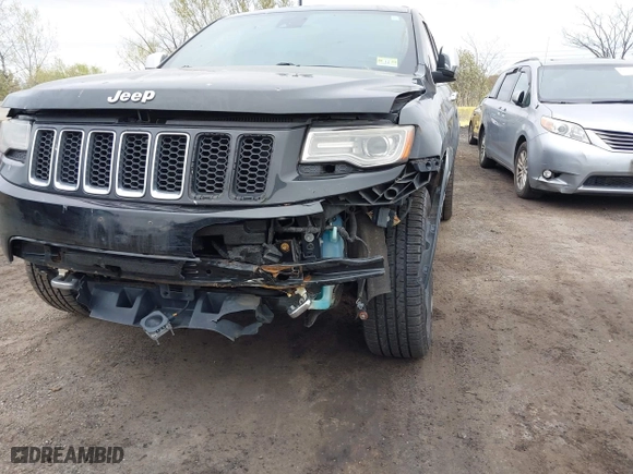 2014 Jeep Grand Cherokee Overland with VIN 1C4RJFCG6EC121654, listed as a IAAI auction lot 42051730 with 163,853 mi miles. Bid and sale history available at carsss.com. Image 17.