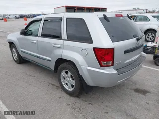 2007 Jeep Grand Cherokee Laredo with VIN 1J8GR48K47C687339, listed as a IAAI auction lot 41904034 with 158,661 mi miles. Bid and sale history available at carsss.com. Image 3.