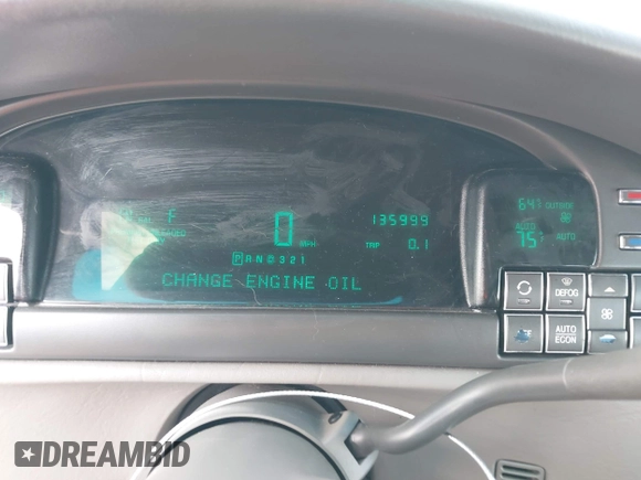 1999 Cadillac DeVille DHS z VIN 1G6KE54Y2XU752599, wystawiony jako IAAI lot #42141950 z przebiegiem 135 999 mil mil oraz . Historia ofert i sprzedaży dostępna na DreamBid. Obrazek 7.