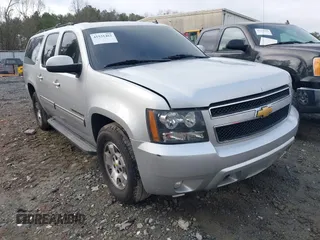 2013 Chevrolet Suburban LT with VIN 1GNSCJE06DR258207, listed as a IAAI auction lot 41531462 with 238,893 mi miles. Bid and sale history available at carsss.com. Image 1.