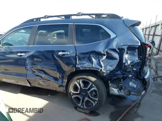 2024 Subaru Ascent Touring z VIN 4S4WMAWD8R3459203, wystawiony jako IAAI lot #41773347 z przebiegiem 1 807 mil mil oraz . Historia ofert i sprzedaży dostępna na DreamBid. Obrazek 6.