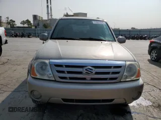 2005 Suzuki XL7 LX z VIN JS3TX92V754106856, wystawiony jako Copart lot #71031154 z przebiegiem 111 715 mil mil oraz Czysty tytuł • Clean title. Historia ofert i sprzedaży dostępna na DreamBid. Obrazek 5.