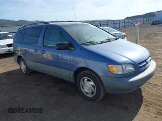 2000 Toyota Sienna LE z VIN 4T3ZF13C2YU183815, wystawiony jako IAAI lot #42462319 z przebiegiem 217 175 mil mil oraz . Historia ofert i sprzedaży dostępna na DreamBid. Obrazek 1.