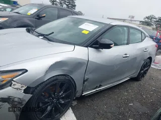2017 Nissan Maxima SR with VIN 1N4AA6AP2HC396545, listed as a IAAI auction lot 41910588 with 142,661 mi miles and . Bid and sale history available at DreamBid. Image 6.