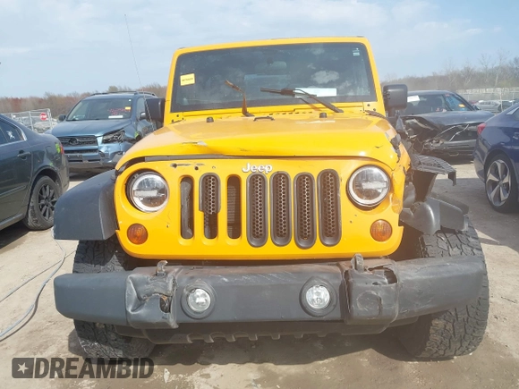 2012 Jeep Wrangler Sport with VIN 1C4AJWAG0CL128595, listed as a IAAI auction lot 42048590 with 133,085 mi miles and . Bid and sale history available at DreamBid. Image 12.