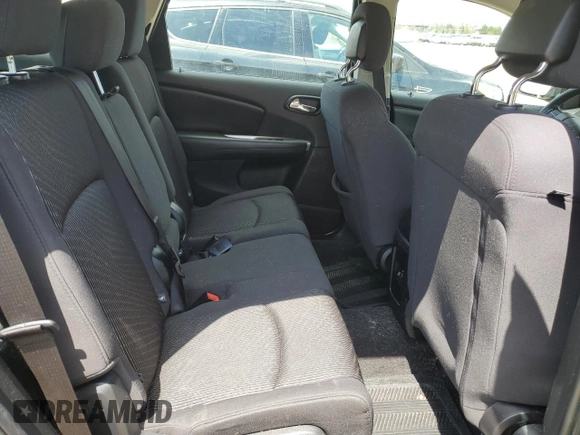 2013 Dodge Journey SE z VIN 3C4PDCAB3DT505527, wystawiony jako Copart lot #56102425 z przebiegiem 217 130 mil mil oraz Szkoda całkowita • Salvage title. Historia ofert i sprzedaży dostępna na DreamBid. Obrazek 11.