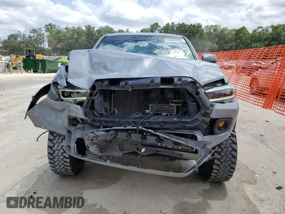 2020 Toyota Tacoma SR5 z VIN 3TMAZ5CN0LM115004, wystawiony jako Copart lot #55343295 z przebiegiem 82 865 mil mil oraz Nie do naprawy • Non repairable. Historia ofert i sprzedaży dostępna na DreamBid. Obrazek 5.
