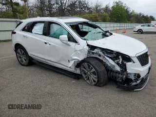 2024 Cadillac XT5 AWD Premium Luxury z VIN 1GYKNDRS9RZ736718, wystawiony jako Copart lot #56117375 z przebiegiem 9 147 mil mil oraz Szkoda całkowita • Salvage title. Historia ofert i sprzedaży dostępna na DreamBid. Obrazek 4.