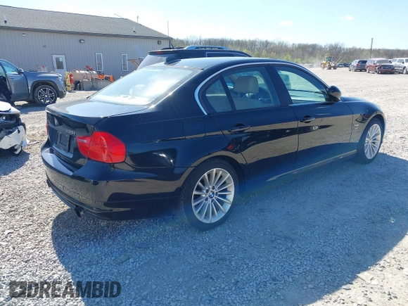 2011 BMW 3 Series 335i xDrive with VIN WBAPL5G50BNN23199, listed as a IAAI auction lot 42041719 with 205,807 mi miles. Bid and sale history available at carsss.com. Image 4.