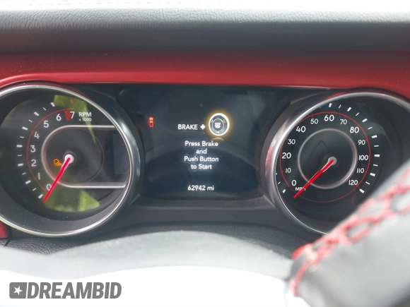 2021 Jeep Gladiator Rubicon z VIN 1C6JJTBG8ML524215, wystawiony jako IAAI lot #41829990 z przebiegiem 62 942 mil mil oraz . Historia ofert i sprzedaży dostępna na DreamBid. Obrazek 7.