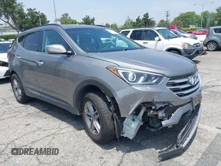 2018 Hyundai Santa Fe 2.4L z VIN 5NMZUDLB3JH096711, wystawiony jako IAAI lot #42405140 z przebiegiem 72 240 mil mil oraz . Historia ofert i sprzedaży dostępna na DreamBid. Obrazek 1.