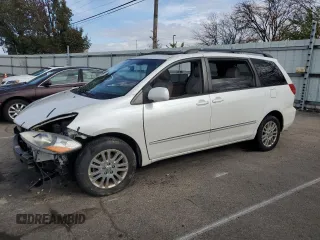 2010 Toyota Sienna XLE z VIN 5TDDK4CC8AS033402, wystawiony jako Copart lot #79083354 z przebiegiem 226 956 mil mil oraz Szkoda całkowita • Salvage title. Historia ofert i sprzedaży dostępna na DreamBid. Obrazek 1.