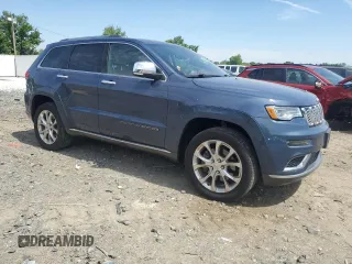 2020 Jeep Grand Cherokee Summit with VIN 1C4RJFJT5LC112392, listed as a Copart auction lot 56391295 with 144,158 mi miles and Salvage title. Bid and sale history available at DreamBid. Image 4.