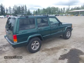 1999 Jeep Cherokee Sport with VIN 1J4FF68S5XL677243, listed as a IAAI auction lot 42221329 with 293,808 mi miles and . Bid and sale history available at DreamBid. Image 4.