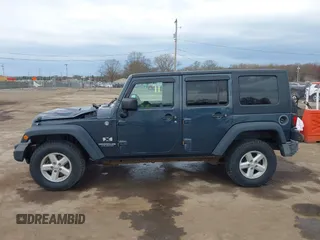 2007 Jeep Wrangler Unlimited X with VIN 1J4GA39137L101321, listed as a IAAI auction lot 42095445 with 243,583 mi miles and . Bid and sale history available at DreamBid. Image 14.