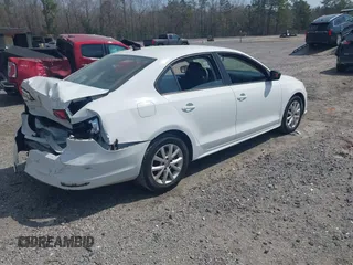 2015 Volkswagen Jetta Sedan 1.8T SE with VIN 3VWD17AJXFM249990, listed as a IAAI auction lot 41810073 with 127,683 mi miles. Bid and sale history available at carsss.com. Image 4.