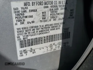 2002 Ford Escape XLS Choice with VIN 1FMYU02112KB00947, listed as a Copart auction lot 48948855 with 223,287 mi miles and Salvage title. Bid and sale history available at DreamBid. Image 13.