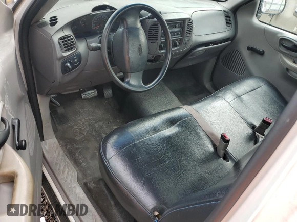 1999 Ford F-150 z VIN 1FTRF17W0XNB79739, wystawiony jako Copart lot #87840925 z przebiegiem Nie podano mil oraz Szkoda całkowita • Salvage title. Historia ofert i sprzedaży dostępna na DreamBid. Obrazek 8.