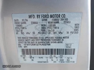 2007 Ford Escape Limited with VIN 1FMYU04127KA52766, listed as a IAAI auction lot 41835886 with 231,570 mi miles. Bid and sale history available at carsss.com. Image 9.