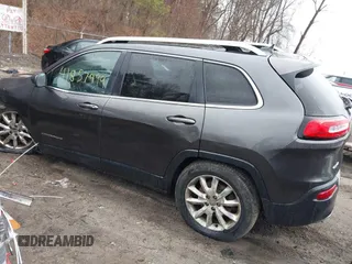2015 Jeep Cherokee Limited with VIN 1C4PJMDS2FW523010, listed as a IAAI auction lot 41857999 with 162,625 mi miles. Bid and sale history available at carsss.com. Image 3.