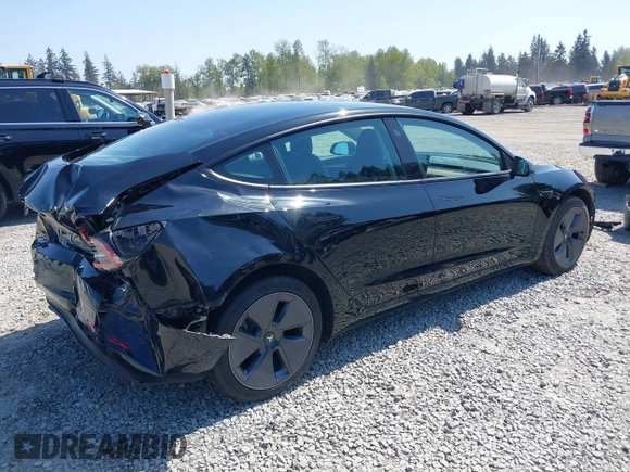 2022 Tesla Model 3 Long Range with VIN 5YJ3E1EB7NF241996, listed as a IAAI auction lot 42115915 with 23,433 mi miles and . Bid and sale history available at DreamBid. Image 4.