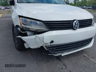 2014 Volkswagen Jetta Sedan S with VIN 3VW2K7AJ6EM334635, listed as a IAAI auction lot 42151738 with 142,923 mi miles. Bid and sale history available at carsss.com. Image 6.