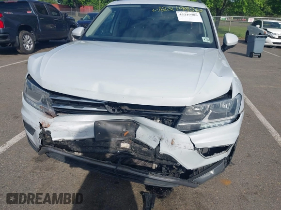 2018 Volkswagen Tiguan S with VIN 3VV0B7AX5JM025815, listed as a IAAI auction lot 42219906 with 168,122 mi miles and . Bid and sale history available at DreamBid. Image 6.