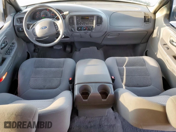 2002 Ford F-150 XLT with VIN 1FTRW08692KD89789, listed as a Copart auction lot 52621555 with 150,012 mi miles and Salvage Title. Bid and sale history available at carsss.com. Image 8.
