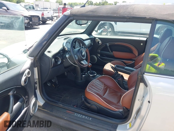 2008 MINI Convertible S with VIN WMWRH335X8TU80600, listed as a IAAI auction lot 42558412 with 105,970 mi miles and . Bid and sale history available at DreamBid. Image 5.