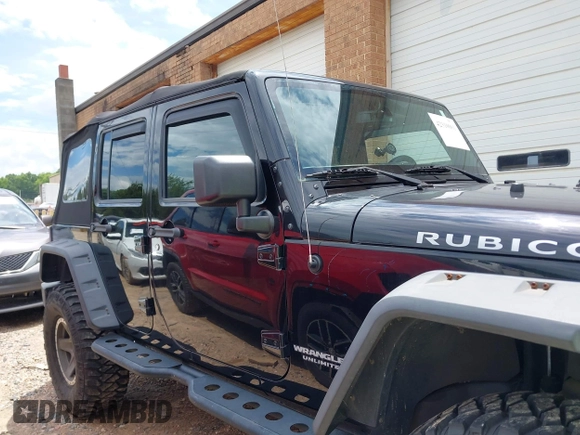 2015 Jeep Wrangler Unlimited Rubicon with VIN 1C4BJWFG4FL566862, listed as a IAAI auction lot 42310901 with 146,206 mi miles and . Bid and sale history available at DreamBid. Image 13.