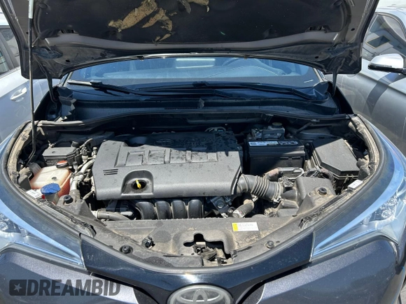 2018 Toyota C-HR XLE with VIN NMTKHMBX1JR004008, listed as a Copart auction lot 61504265 with 106,802 mi miles and Clean title. Bid and sale history available at DreamBid. Image 7.