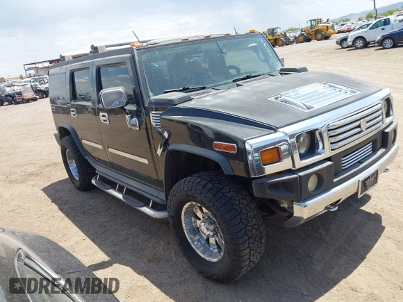 2003 Hummer H2 with VIN 5GRGN23U73H122756, listed as a IAAI auction lot 42194176 with 239,411 mi miles. Bid and sale history available at carsss.com. Image 1.