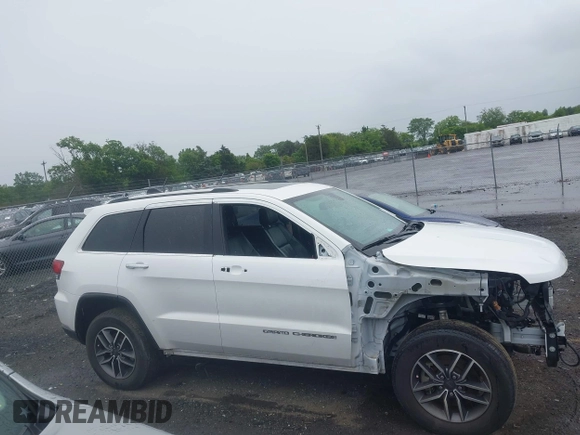 2021 Jeep Grand Cherokee Limited with VIN 1C4RJFBG5MC665126, listed as a IAAI auction lot 42277069 with 114,232 mi miles and . Bid and sale history available at DreamBid. Image 14.