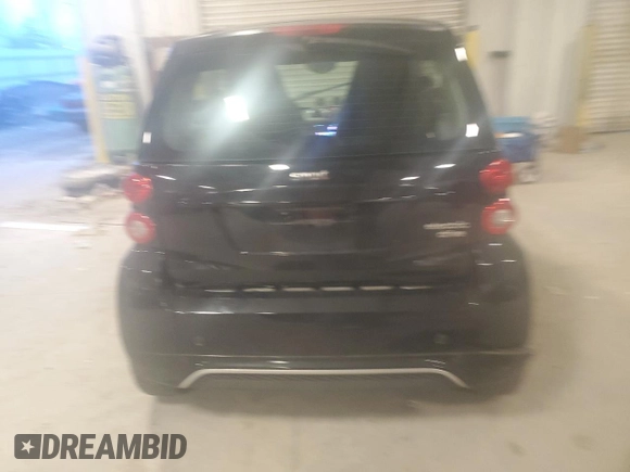 2013 Smart fortwo Passion z VIN WMEEJ9AAXDK673744, wystawiony jako Copart lot #41709255 z przebiegiem Nie podano mil oraz Tytuł czysty. Historia ofert i sprzedaży dostępna na DreamBid. Obrazek 6.
