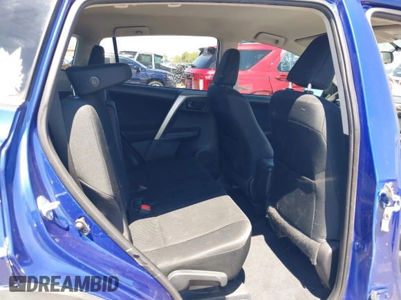 2014 Toyota RAV4 LE with VIN 2T3ZFREV9EW124480, listed as a IAAI auction lot 42579578 with 117,799 mi miles and . Bid and sale history available at DreamBid. Image 8.