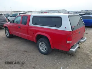 2003 Dodge Dakota SLT with VIN 1D7HL42X43S247404, listed as a IAAI auction lot 41685036 with 95,054 mi miles. Bid and sale history available at carsss.com. Image 3.