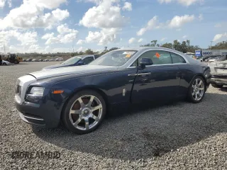 2014 Rolls-Royce Wraith z VIN SCA665C55EUX84597, wystawiony jako Copart lot #79843344 z przebiegiem Nie podano mil oraz Szkody całkowita. Historia ofert i sprzedaży dostępna na DreamBid. Obrazek 1.