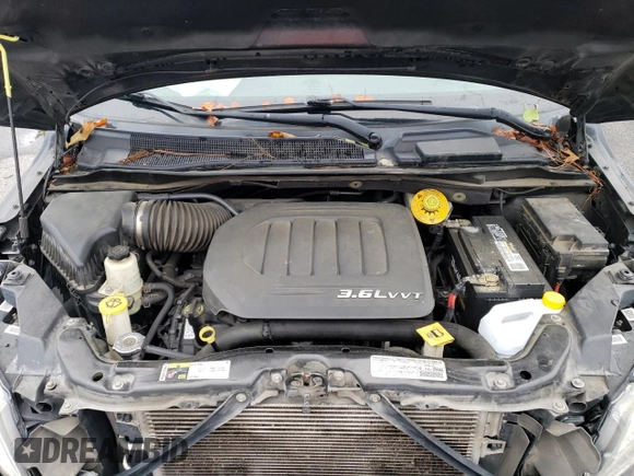 2014 Volkswagen Routan SE z VIN 2C4RVABG1ER134621, wystawiony jako Copart lot #61339414 z przebiegiem 153 364 mil mil oraz Szkoda całkowita • Salvage title. Historia ofert i sprzedaży dostępna na DreamBid. Obrazek 13.
