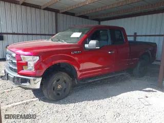 2015 Ford F-150 XLT with VIN 1FTFX1EF7FFA94960, listed as a IAAI auction lot 40268057 with 143,717 mi miles. Bid and sale history available at carsss.com. Image 2.