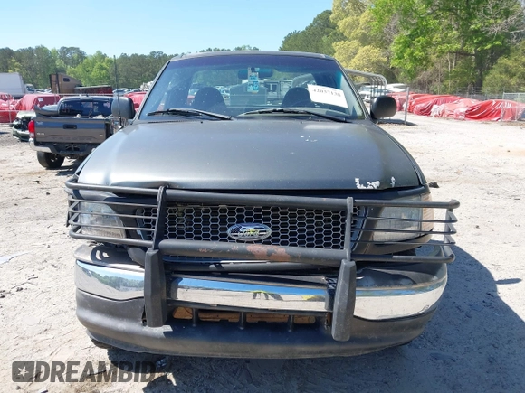 2003 Ford F-150 XL with VIN 1FTRF18243NB29920, listed as a IAAI auction lot 42037138 with 230,215 mi miles and . Bid and sale history available at DreamBid. Image 12.
