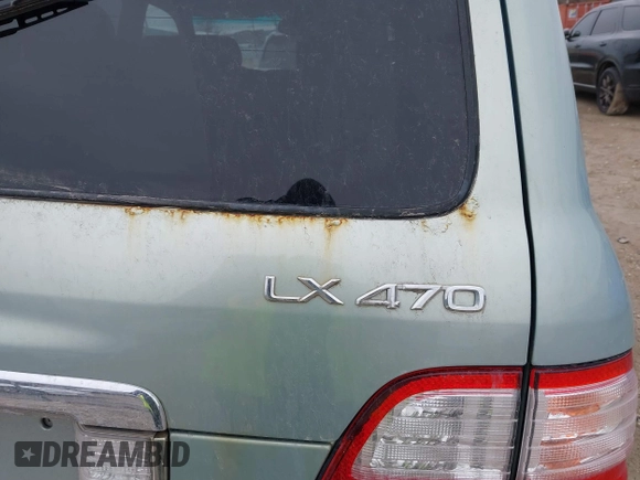 2004 Lexus LX 470 z VIN JTJHT00W143546192, wystawiony jako IAAI lot #41673810 z przebiegiem 232 196 mil mil oraz . Historia ofert i sprzedaży dostępna na DreamBid. Obrazek 20.