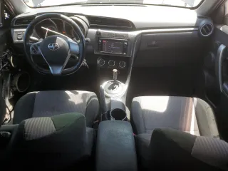 2015 Scion tC z VIN JTKJF5C76FJ010813, wystawiony jako Copart lot #58987575 z przebiegiem 108 709 mil mil oraz Szkoda całkowita • Salvage title. Historia ofert i sprzedaży dostępna na DreamBid. Obrazek 8.