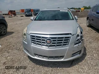 2013 Cadillac XTS Luxury с VIN 2G61P5S30D9122912, выставлен на аукционе Copart как лот 56970895 с пробегом 189 310 миль миль и Списание • Salvage title. История ставок и продаж доступна на DreamBid. Изображение 5.