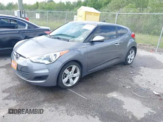 2013 Hyundai Veloster w/Black Int with VIN KMHTC6AD6DU169765, listed as a IAAI auction lot 41928516 with 130,708 mi miles and . Bid and sale history available at DreamBid. Image 17.