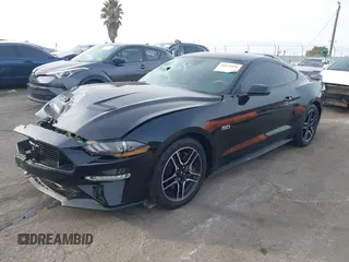 2021 Ford Mustang GT with VIN 1FA6P8CF2M5124404, listed as a IAAI auction lot 41072026 with 48,310 mi miles. Bid and sale history available at carsss.com. Image 2.