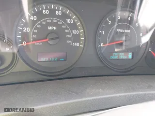 2005 Jeep Grand Cherokee Laredo with VIN 1J8HR48N55C556383, listed as a IAAI auction lot 41814624 with 189,102 mi miles. Bid and sale history available at carsss.com. Image 7.