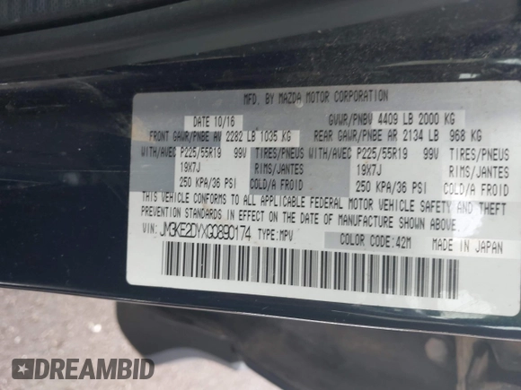 2016 Mazda CX-5 Grand Touring with VIN JM3KE2DYXG0890174, listed as a IAAI auction lot 42157884 with 141,873 mi miles. Bid and sale history available at carsss.com. Image 9.