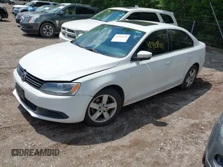 2013 Volkswagen Jetta TDI w/Premium/Nav with VIN 3VWLL7AJ9DM300544, listed as a IAAI auction lot 42401610 with 157,585 mi miles and . Bid and sale history available at DreamBid. Image 2.