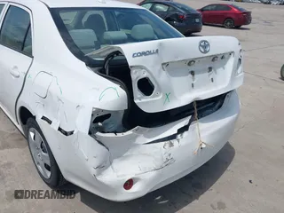 2010 Toyota Corolla with VIN 1NXBU4EE2AZ288893, listed as a IAAI auction lot 42065454 with 140,064 mi miles. Bid and sale history available at carsss.com. Image 6.