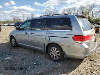 2010 Honda Odyssey EX-L with VIN 5FNRL3H78AB030903, listed as a Copart auction lot 52911705 with 200,499 mi miles and Salvage Title. Bid and sale history available at carsss.com. Image 2.